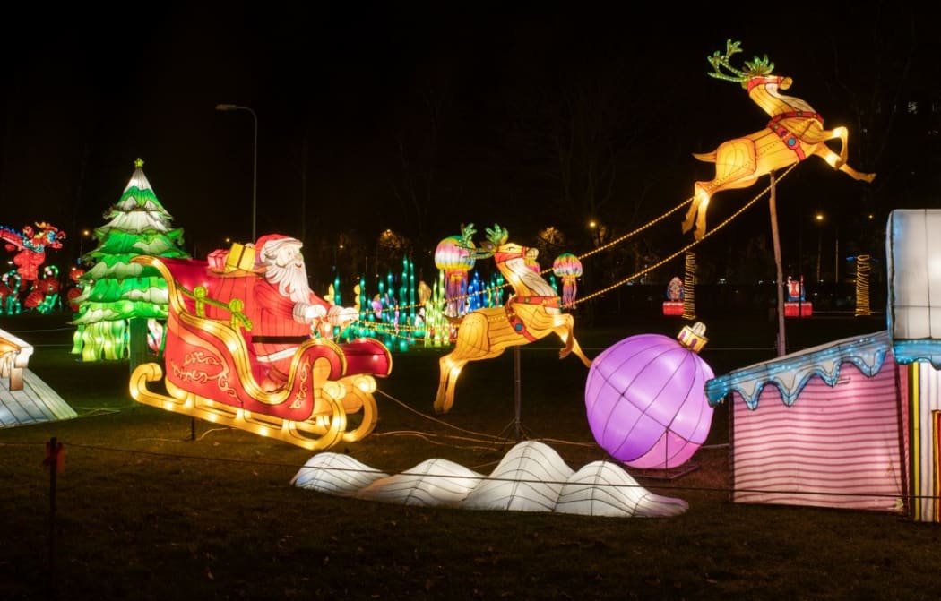 A christmas inspired light sculpture is displayed during a chinese-themed light sculpture festival in Tallinn