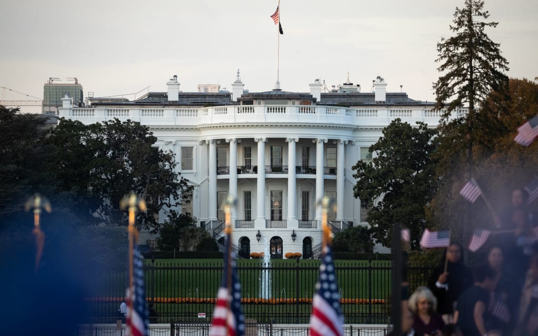 The White House stands in the distance behind the stage on the Ellipse for Vice President Kamala Harris' “closing argument” for the presidential election in Washington, DC, on October 29, 2024.  Speaking to a crowd of roughly 75,000 people at the site of ex-President Donald Trump’s infamous speech on January 6, 2021, the Democratic nominee emphasized her policies to benefit everyday Americans and warned of the threat to democracy posed by Trump. (Photo by Allison Bailey/NurPhoto) (Photo by Allison Bailey / NurPhoto / NurPhoto via AFP)