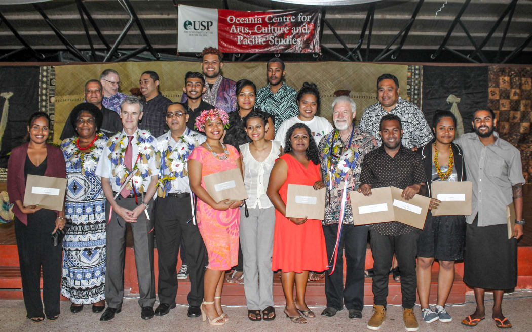 French Ambassador Michel Djokovic, front row (third from left) and Professor David Robie from AUT’s Pacific Media Centre (fifth from right) with dignitaries, a few members of USP’s senior management team and USP Journalism award recipients.