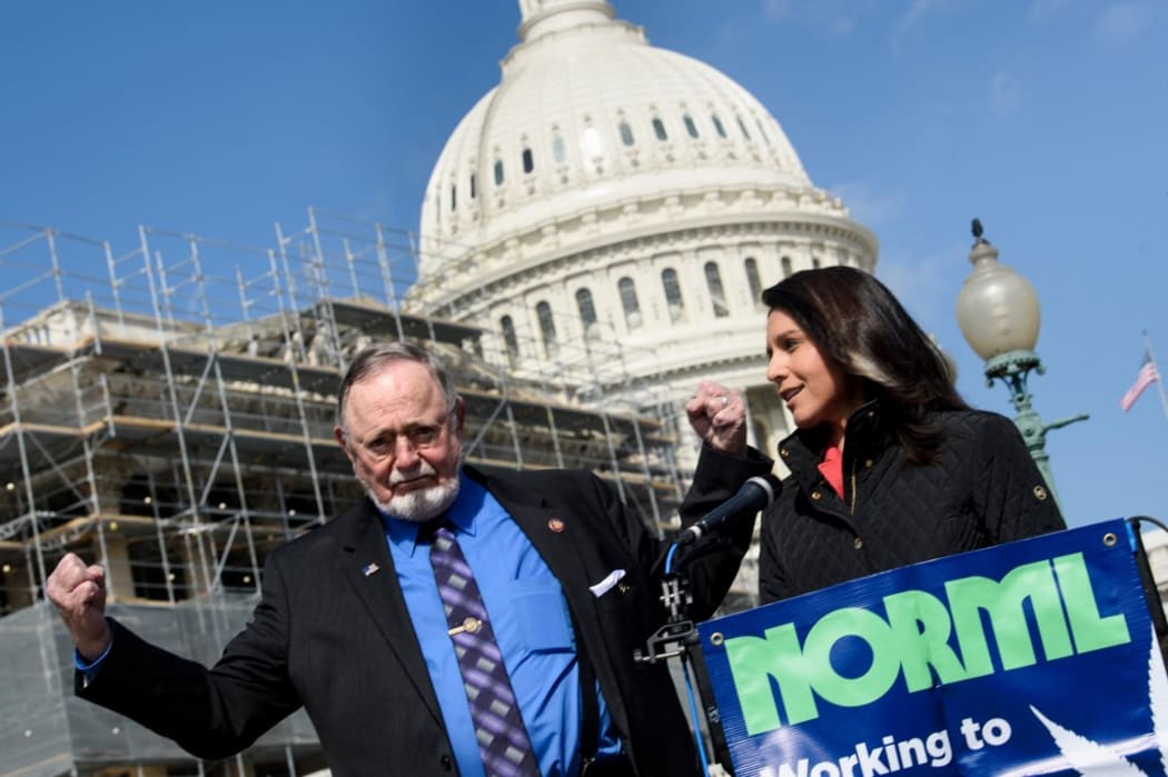 US Congressman Don Young, Republican of Alaska, left, with Rep. Tulsi Gabbard on Capitol Hill March 7, 2019 in Washington, DC.