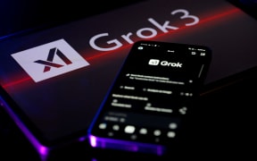 The Grok X AI app displays on a mobile phone with the Grok X AI logo, as seen in this photo illustration in Brussels, Belgium, on February 16, 2025. (Photo by Jonathan Raa/NurPhoto) (Photo by Jonathan Raa / NurPhoto / NurPhoto via AFP)