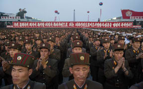 Soldiers of the Korean People's Army stand in formation during celebrations marking the July 4 launch of the Hwasong-14 intercontinental ballistic missile, in Pyongyang (file photo).