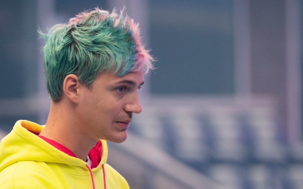 Richard Tyler Blevins, aka Ninja, speaks to the crowd at the start of the 2019 Fortnite World Cup Finals - Round Two on July 27, 2019, at Arthur Ashe Stadium, in New York City.