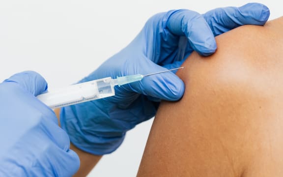 person getting vaccinated