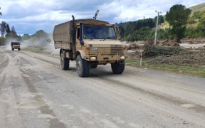 Army trucks heading east on State Highway 5 in Esk River Valley on Wednesday.