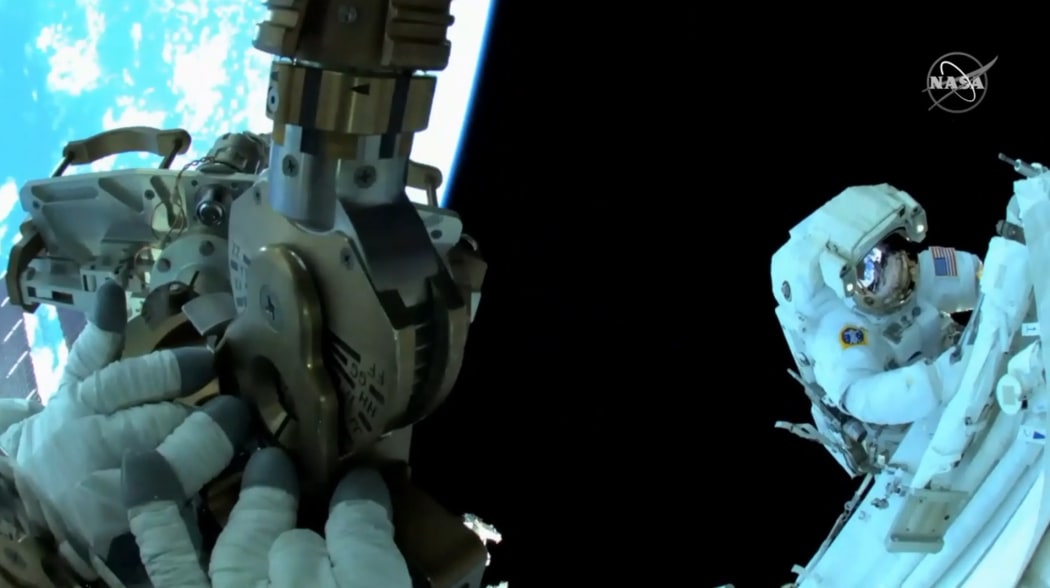 ISS astronauts on a space walk on March 1, 2021