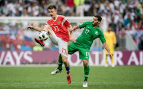 Aleksandr Golovin of Russia fields the ball against Saudi Arabia in the World Cup opener.