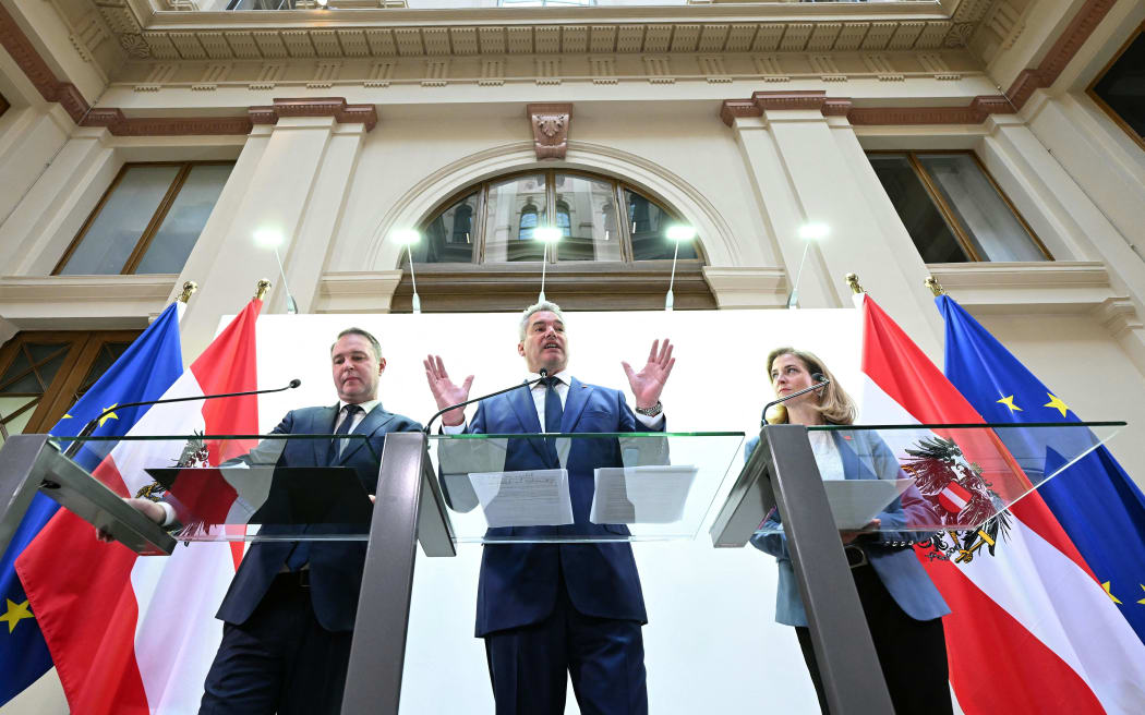 Austrian politicians giving a media conference updating about now-collapsed talks on forming a new government.