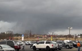 In a screenshot from a video posted to social media, a possible tornado is shown in Clarksville, Tennessee on Saturday.