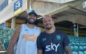 Moana Pasifika players halfback Johnathan Taumateine (left) and winger Lalomilo Lalomilo at the Moana Pasifika training, North Harbour Stadium on Thursday. Photo: Grace Fiavaai