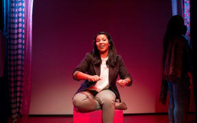 Porvi Fomra speaks during her stand-up comedy debut.