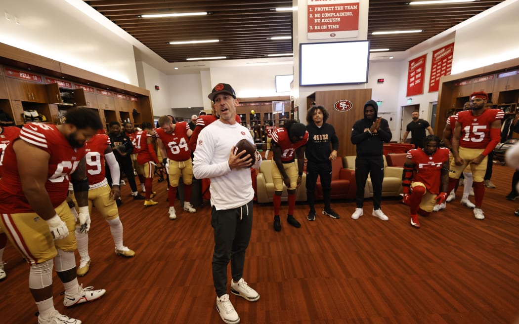 Head Coach Kyle Shanahan of the San Francisco 49ers addresses the team in the locker room before the NFC Divisional Playoff game against the Green Bay Packers.
