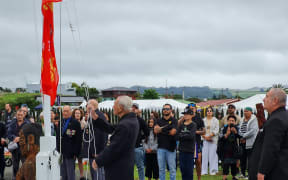 The 28 Māori Batallion flag raised for the first time with full battle honours, on Waitangi Day 2023, in Rotorua.