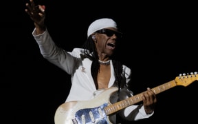 US musician Nile Rodgers with his band Chic performs during the Noches del Botanico festival in Madrid on July 11, 2023. (Photo by PIERRE-PHILIPPE MARCOU / AFP)