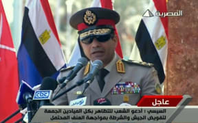 General Abdel Fattah al-Sisi during a live TV broadcast.