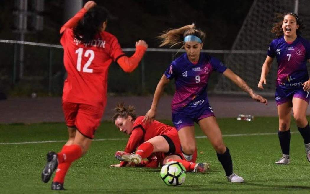 Trina Davis on the ball for ASA Tel Aviv University SC.