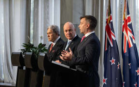 Coalition agreement signing ceremony between Christopher Luxon, David Seymour and Winston Peters.