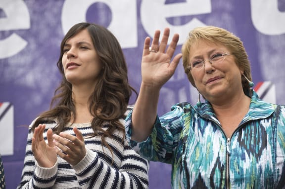 Camila Vallejo with President Bachelet.