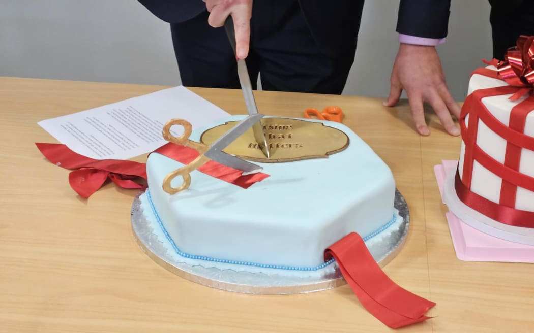Ministers David Seymour and Andrew Hoggard cut cakes and red tape at Parliament.