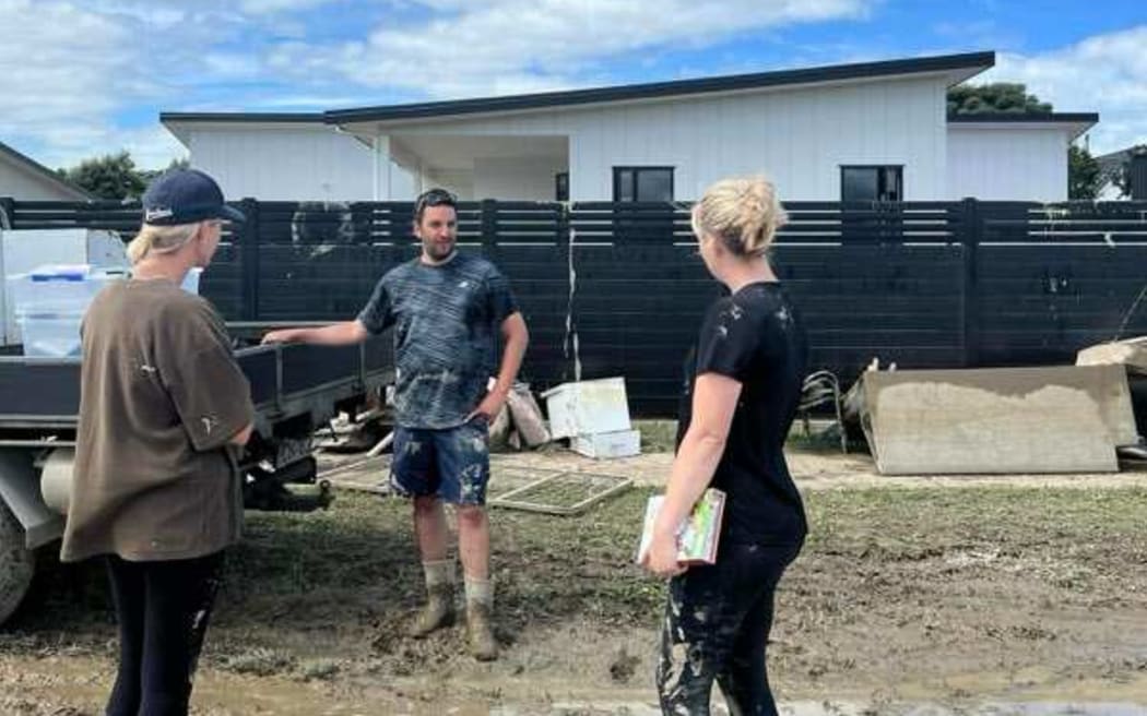 Jayde Demanser (right) and her husband Matt, with friend Bree Claudatos who helped with the clean up.