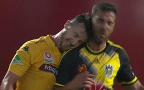 The Mariners' Roy O'Donovan headbutts the Phoenix's Manny Muscat