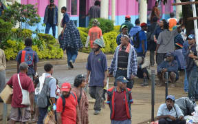 People going about their day in Goroka, Papua New Guinea