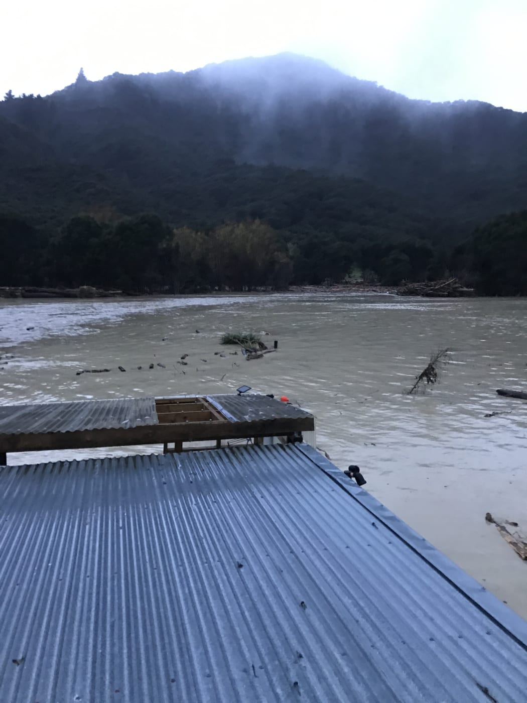 The Uawa river in flood at Tolaga Bay.