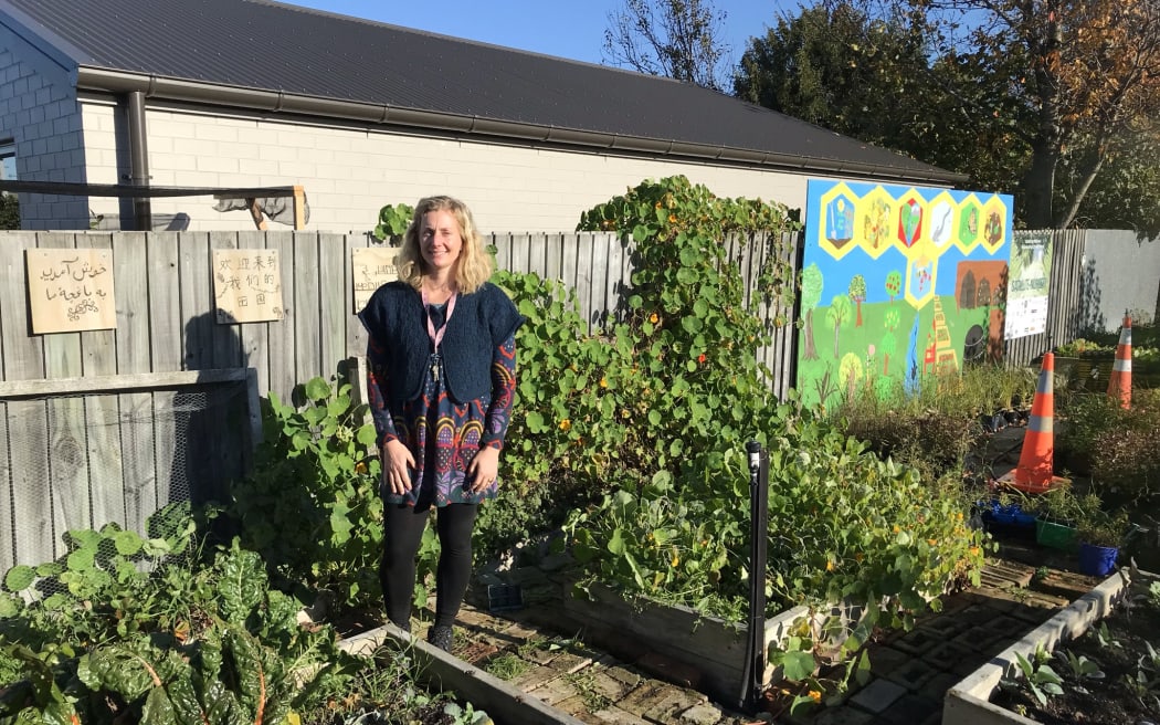 Bianca Woyak stands in the schools veggie patch.