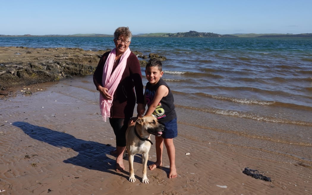 Te Hāpua Marae Komiti member Lydia with her mokopuna Tyler.
