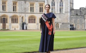 Former New Zeland's Prime Minister Jacinda Ardern, wearing a traditional Maori Kakahu cloak, poses with their medal and insignia after being appointed a Dame Grand Commander of of the New Zealand Order of Merit at Windsor Castle,west of London, on October 16, 2024. -  (Photo by Andrew Matthews / POOL / AFP)