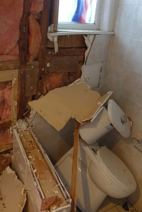 The bathroom of the house was severely damaged.