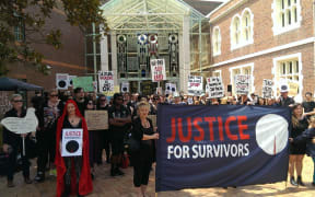 About 200 people protested outside the Auckland High Court on 22 November 2014 over the failure of police to prosecute anyone in connection with a group of teens who boasted online of sex with underage girls.