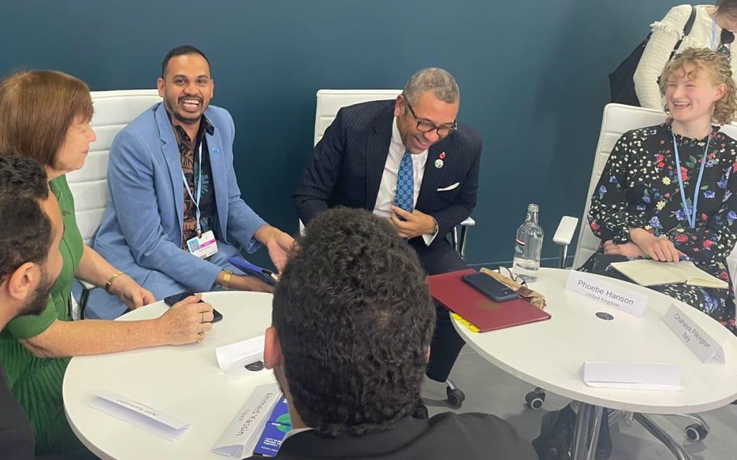 Fiji delegate Sivendra Michael meets UK foreign minister James Cleverly at COP27