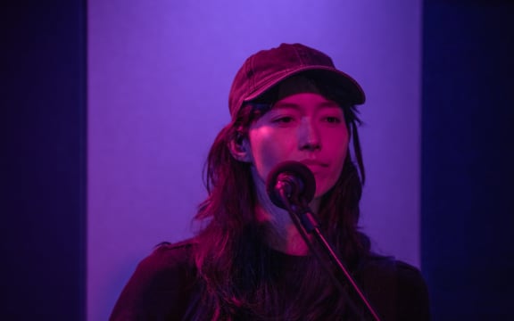 Amelia Murray, also known as the musician Fazerdaze, in the RNZ studio for NZ Live.