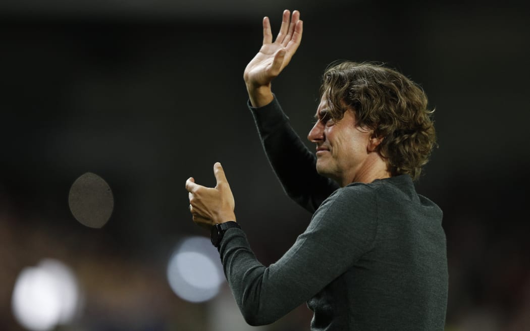 Brentford's Danish head coach Thomas Frank waves to the crowd at the end of the English Premier League football match against Arsenal at Brentford Community Stadium in London on August 13, 2021.