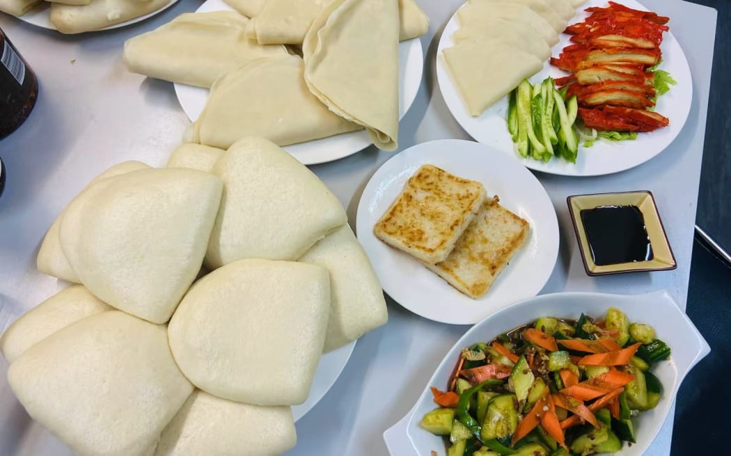 Joyve Cafe in Auckland serves vegetarian Peking duck (top right), a cucumber salad (bottom right) and turnip Cake (middle).