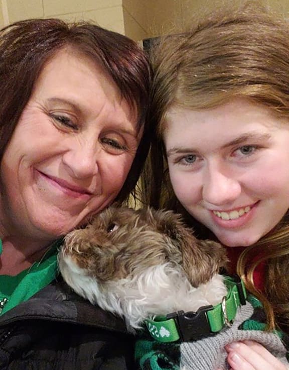 Jayme Closs (right) with her aunt Jennifer Naiberg Smith and Molly the dog,after being reunited on January 11, 2019.