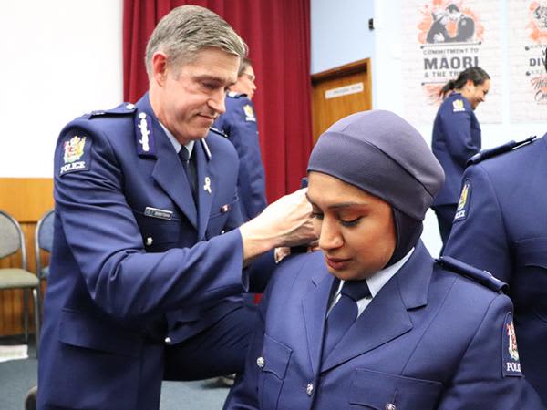 Commissioner Andy Coster and Constable Zeena Ali at her attestation ceremony in November 2020.