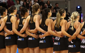 The Silver Ferns stand for the national anthems during game 2 of the Taini Jamison Trophy - New Zealand Silver Ferns v England Roses at Te Rauparaha Arena, Porirua, Wellington. 2 October 2024. © Copyright image by Marty Melville / www.photosport.nz