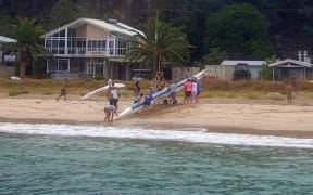 The boat was towed back to shore.