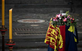 The coffin of Queen Elizabeth II lies inside Westminster Abbey in London on September 19, 2022, ahead of the State Funeral Service.