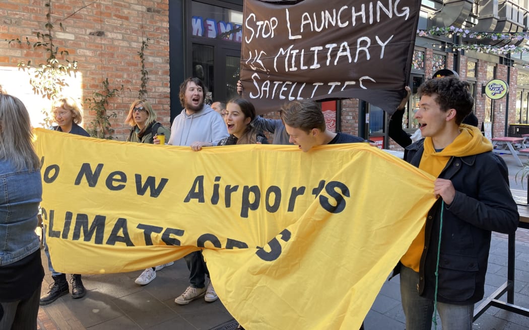 Climate protestors at Riverside Market, where Chris Hipkins was due to visit, chanting “we thought Labour supported universities” on 12 September, 2023.