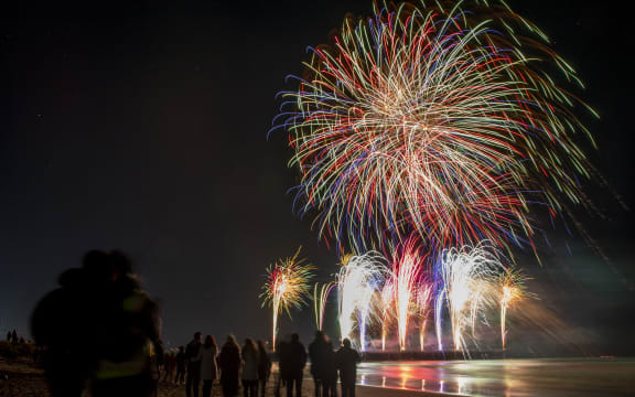 Fireworks illuminate the sky above the New Brighton Pier during Christchurch's first-ever Matariki fireworks spectacular in Christchurch, New Zealand on July 10, 2021. The Matariki is an annual new year celebration of the Maori's, the indigenous people of New Zealand. (Photo by Sanka Vidanagama/NurPhoto) (Photo by SANKA VIDANAGAMA / NurPhoto via AFP)