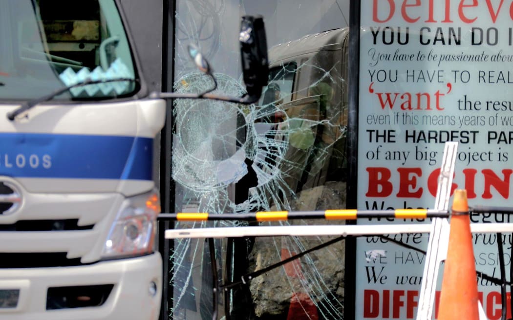 Massey High School principal Alastair Fairley said a large number of windows at the front of his school were smashed using blunt objects, and school vehicles also had windows smashed.