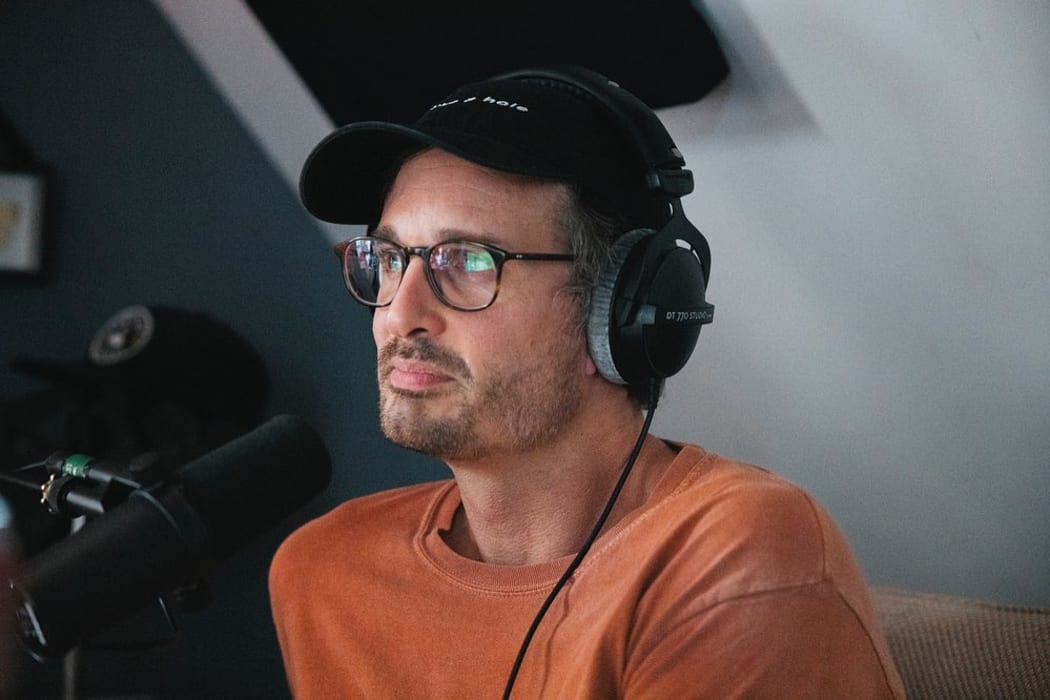 New Zealand journalist David Farrier recording an episode of the podcast Armchaired & Dangerous