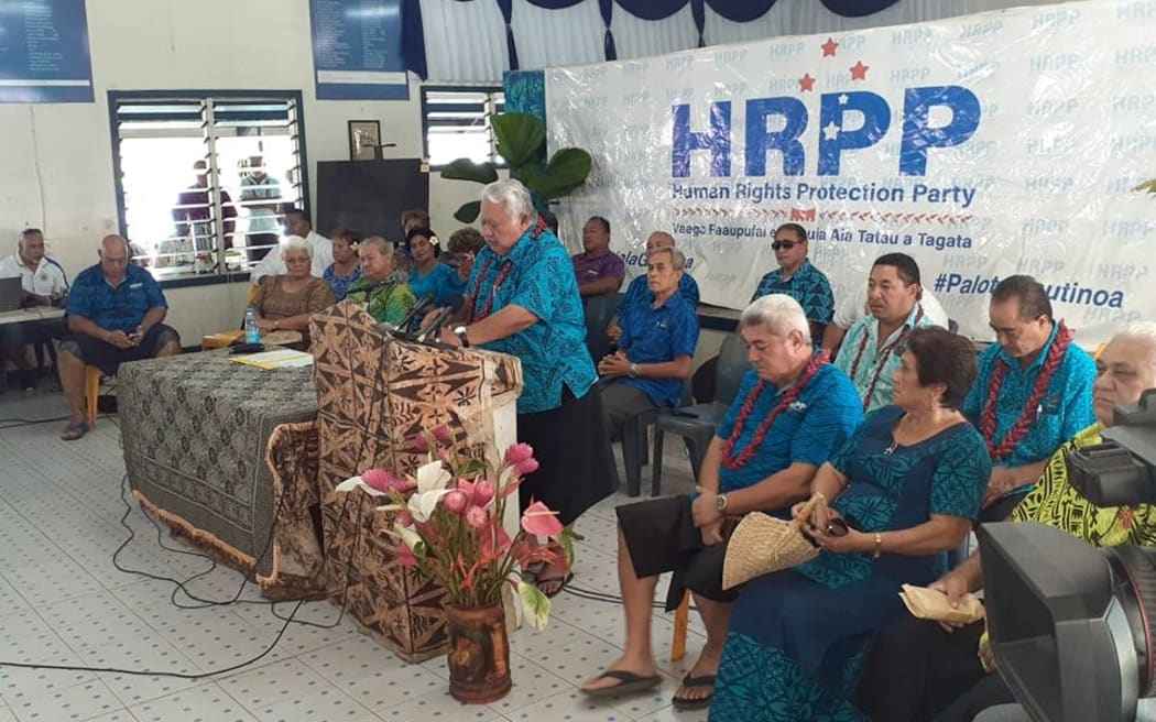 Samoa's outgoing prime minister Tuilaepa Sailele Malielegaoi supporting HRPP members.