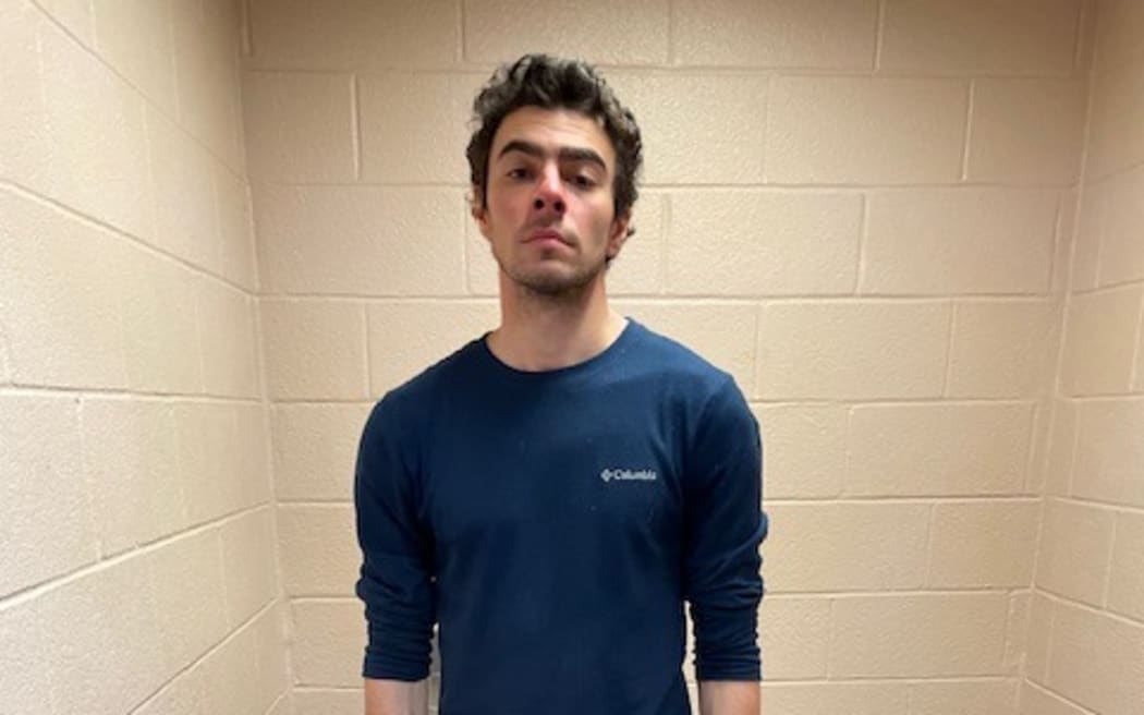 ALTOONA, PENNSYLVANIA - DECEMBER 09: (EDITORâ€™S NOTE: This Handout image was provided by a third-party organization and may not adhere to Getty Imagesâ€™ editorial policy.) In this handout photo released by the Altoona Police Department, Luigi Mangione is seen in a holding cell after being taken into custody on December 9, 2024 in Altoona, Pennsylvania. According to the Pennsylvania Department of Corrections, Mangione, the suspect in the shooting of UnitedHealthcare CEO Brian Thompson in New York City, has been moved to the State Correctional Institution (SCI) in Huntingdon, Pennsylvania. (Photo by Altoona Police Department via Getty Images)