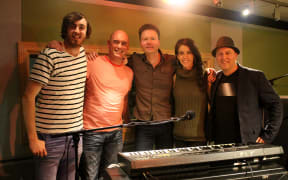 Kevin Field (centre) performing at Radio New Zealand