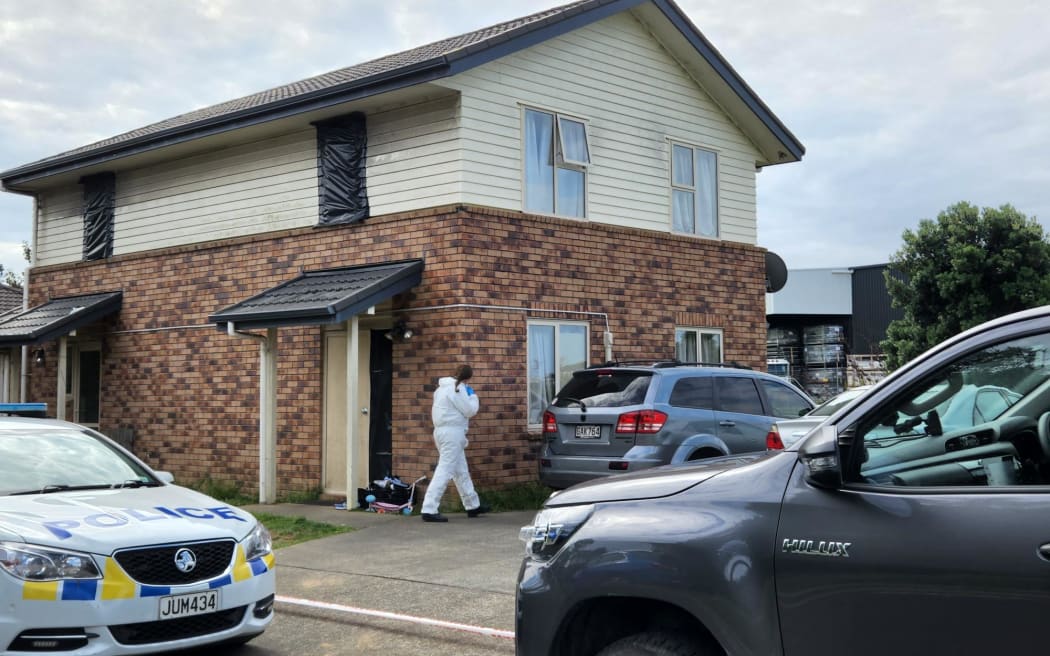 Police forensic specialists examining a house in Mangere Bridge.