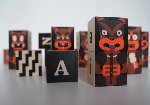 Maori alphabet blocks created by Johnson Witehira.